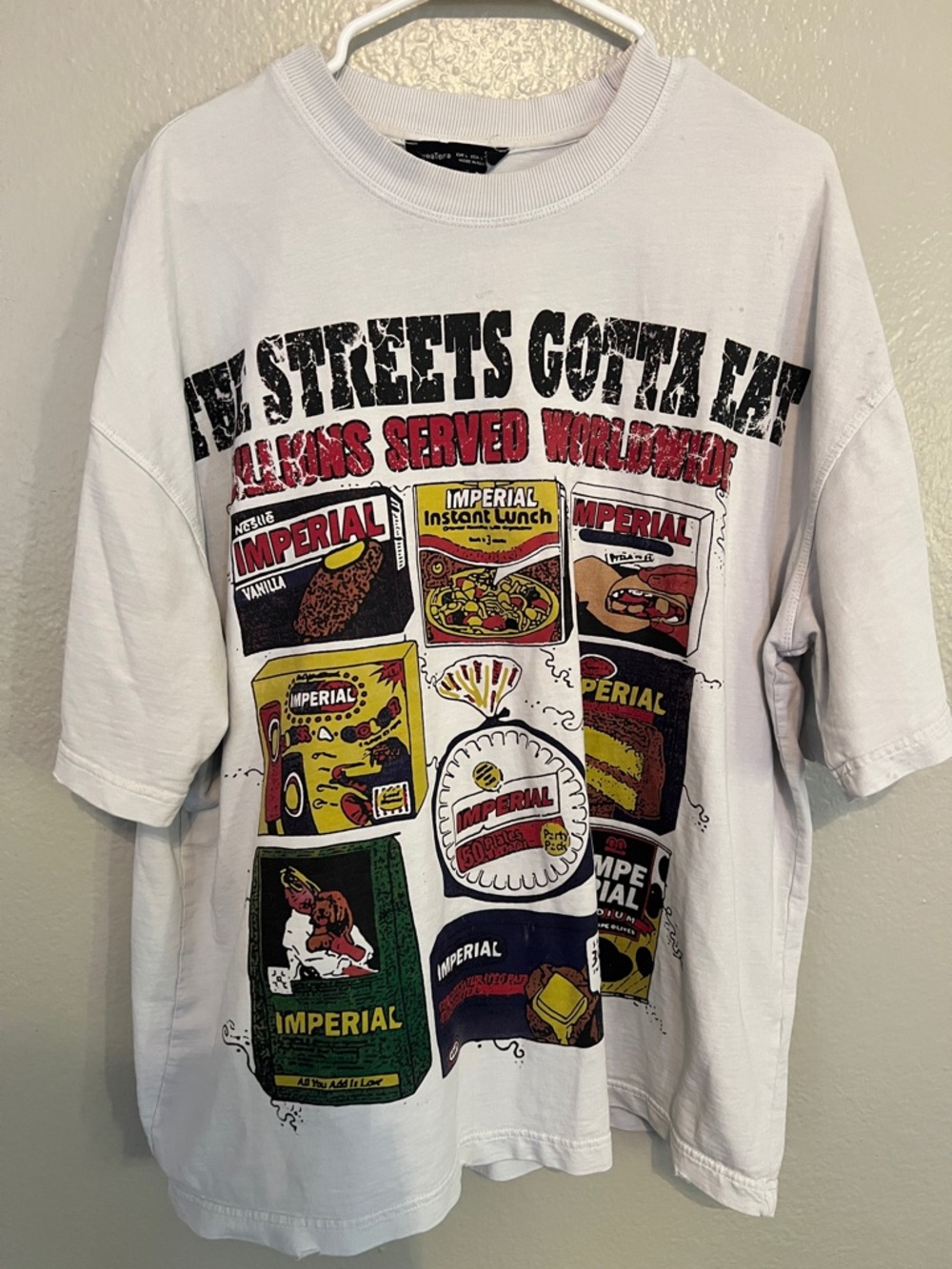 Graphic White Short Sleeve Tee with Multicolor Vintage Can Print